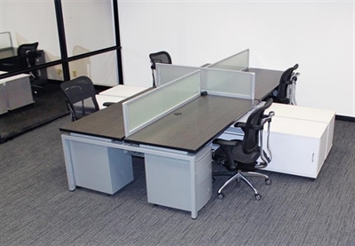 Picture of Cluster of 4 Person Bench Seating Teaming Workstation with Filing Storage and Power Management